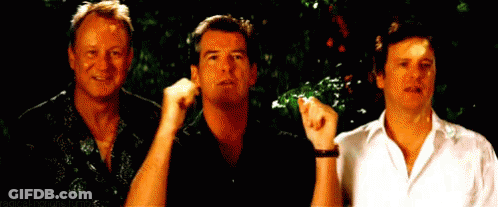 Three Men Are Standing Next To Each Other And One Of Them Is Pointing At Something . GIF