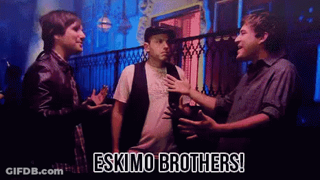 Three Men Are Standing Next To Each Other With The Words Eskimo Brothers Written On The Bottom GIF