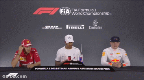 Three Men At FIA Formula 1 Table GIF