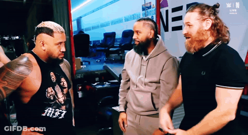 Three Men By Ne Sign GIF