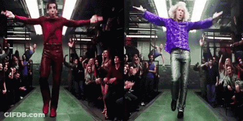 Three Men Dancing In Front Of Crowd GIF