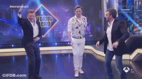 Three Men Dancing On Stage GIF