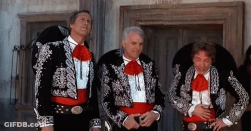Three Men Dressed In Mariachi Costumes Are Standing Next To Each Other GIF