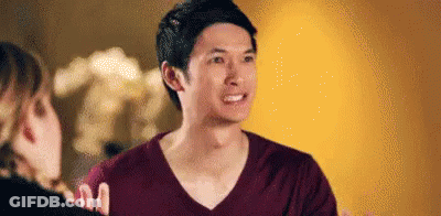 Three Men High Five In Front Of Blue Sky GIF