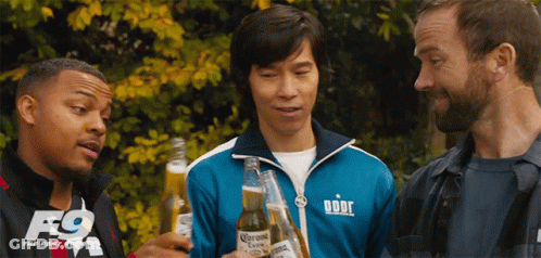 Three Men Holding Corona Beer In Front Of F9 Sign GIF