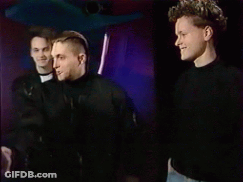 Three Men Holding Gold Record GIF