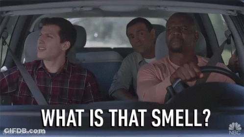 Three Men In A Car With The Words " What Is That Smell " On The Screen GIF