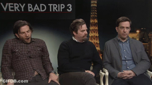 Three Men In Front Of Bad Trip 3 Sign GIF