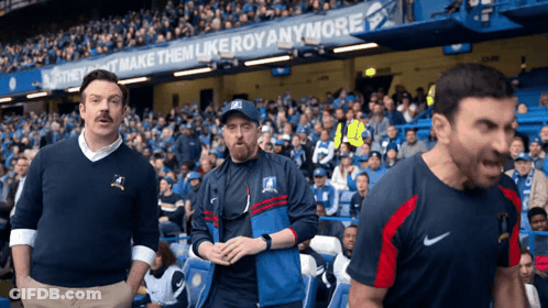 Three Men In Front Of Banner Saying They Dont Make Them Likeroy Anymore GIF
