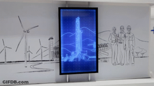 Three Men In Front Of Blue Screen With Wind Turbines GIF