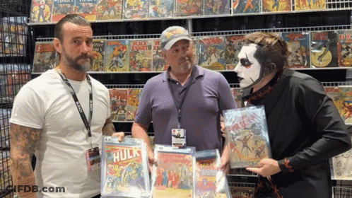 Three Men In Front Of Comic Book Wall GIF