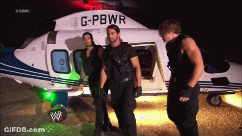 Three Men In Front Of Helicopter Saying G-PBWR GIF