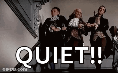 Three Men In Historical Costumes On Stairs Saying Quiet GIF