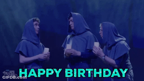 Three Men In Hooded Cloaks Toasting With Cups Of Coffee And The Words Happy Birthday GIF