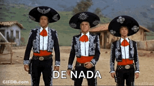 Three Men In Mariachi Outfits Are Standing Next To Each Other And The Words De Nada Are Visible GIF