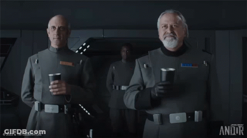 Three Men In Military Uniforms With Star Wars Logo GIF