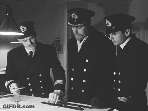 Three Men In Military Uniforms With The Number 16 On Their Sleeve GIF