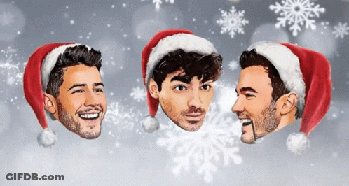 Three Men In Santa Hats With Snowflakes GIF