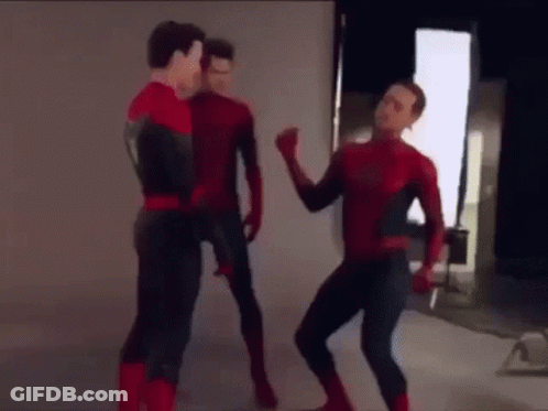 Three Men In Spiderman Costumes Are Standing Next To Each Other And Dancing . GIF