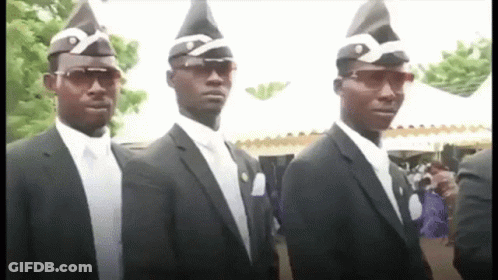 Three Men In Suits And Hats Are Standing Next To Each Other In A Row . GIF