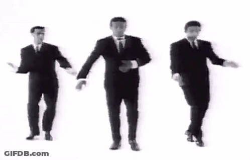Three Men In Suits And Ties Are Dancing Together In A Black And White Video . GIF