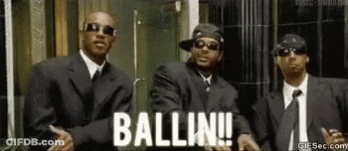 Three Men In Suits And Ties Are Standing Next To Each Other In Front Of A Building And They Are Dancing . GIF