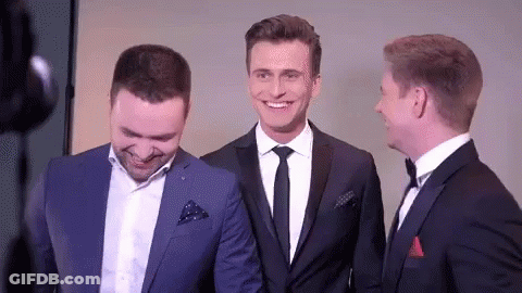 Three Men In Suits And Ties Are Standing Next To Each Other Smiling . GIF
