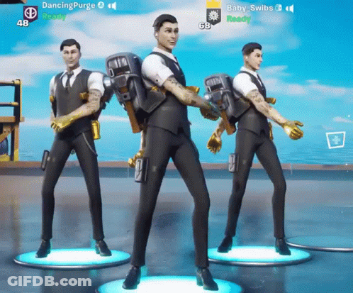 Three Men In Suits Are Dancing In Front Of A Blue Sky GIF