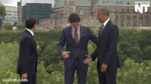 Three Men In Suits At Nowthis NT Building GIF