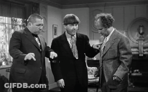 Three Men In Suits Pointing In Living Room GIF