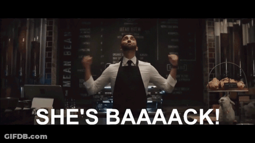 Three Men In Suits Surprised In Dark Room GIF