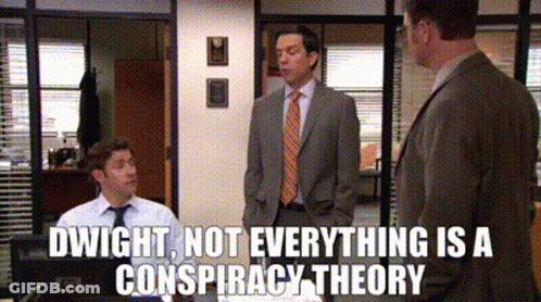 Three Men In Suits With Caption Dwight Not Everything Is A C GIF