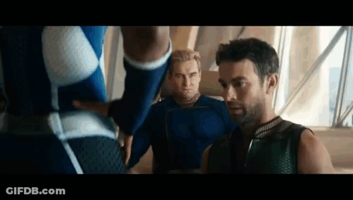Three Men In Superhero Costumes GIF