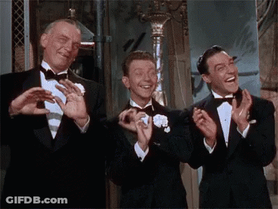 Three Men In Tuxedos Clapping GIF