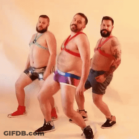Three Men In Underwear Dancing In A Row GIF