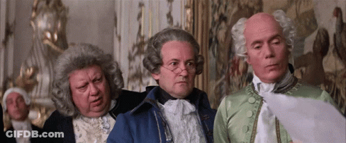 Three Men In Wigs One Wearing Glasses GIF