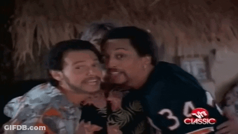 Three Men Laughing, One In Number 4 Jersey GIF