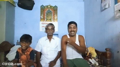 Three Men On Bed With Odia Calendar GIF