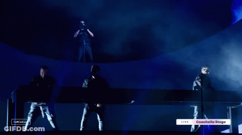 Three Men On Coachella Stage GIF