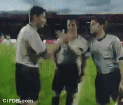 Three Men On Soccer Field Wearing UA Shirt GIF