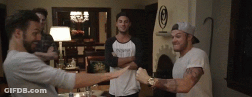 Three Men One Wearing Onepper Shirt GIF