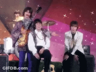 Three Men Playing Guitars GIF