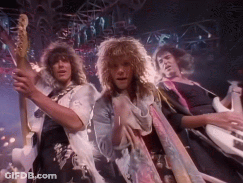 Three Men Playing Guitars In A Band One With Scarf GIF