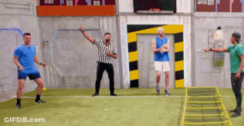 Three Men Playing Soccer With Referee GIF