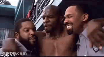 Three Men Posing, One Shirtless GIF