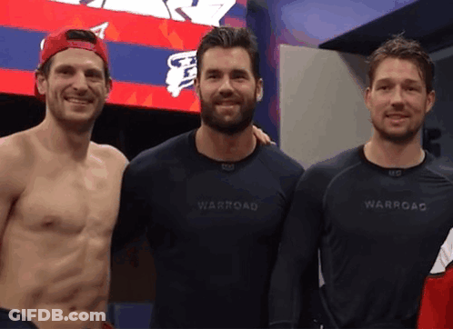 Three Men Posing One Wearing Warroad Shirt GIF