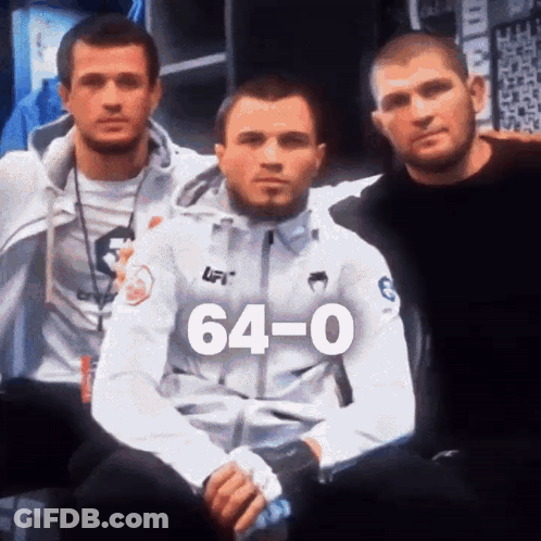 Three Men Posing With 64-0 GIF