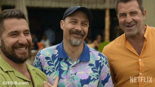 Three Men Posing With Netflix Logo GIF