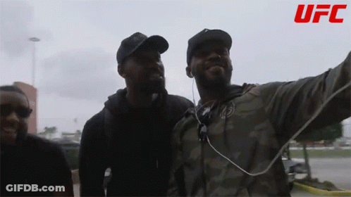 Three Men Posing With UFC Logo GIF