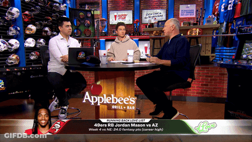 Three Men Sit At An Applebee 'S Table Talking GIF